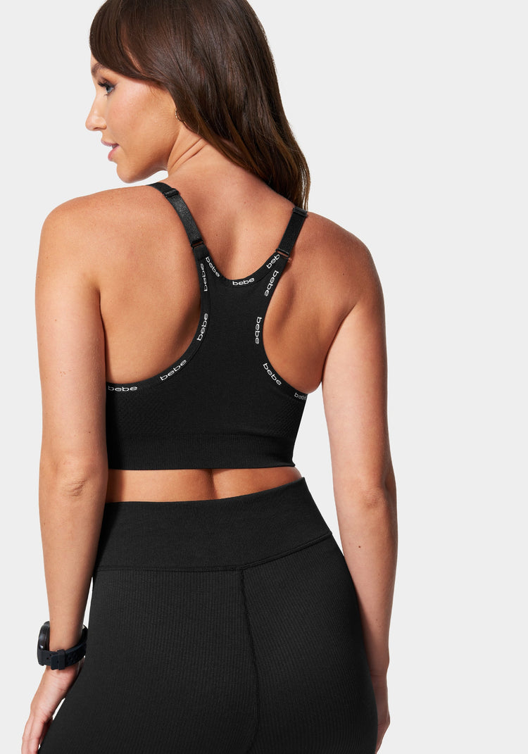 bebe Sport Women's Seamless Strappy Racer Back Style Sport Bra with Mini  Logo Taping, Charcoal Grey, S : Buy Online at Best Price in KSA - Souq is  now : Fashion
